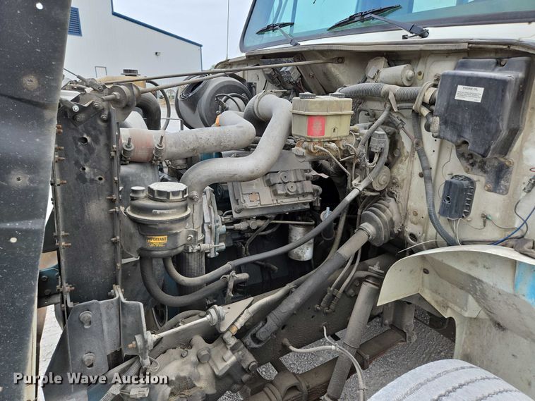 image for item ED2178 2000 International 4700 flatbed truck