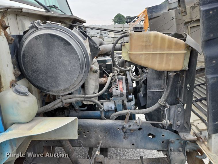 image for item ED2178 2000 International 4700 flatbed truck