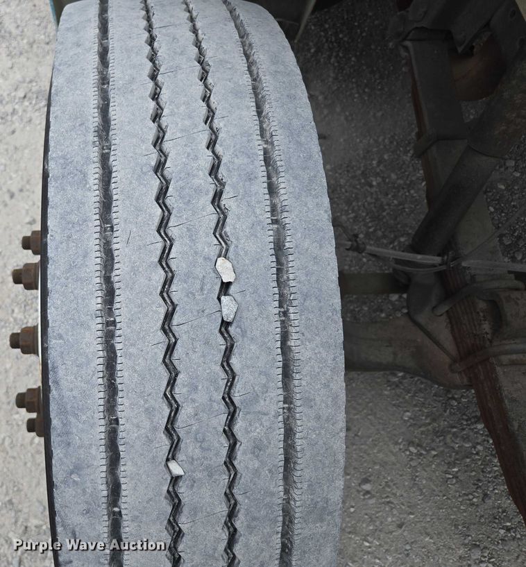 image for item ED2178 2000 International 4700 flatbed truck