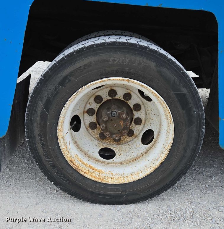 image for item ED2178 2000 International 4700 flatbed truck