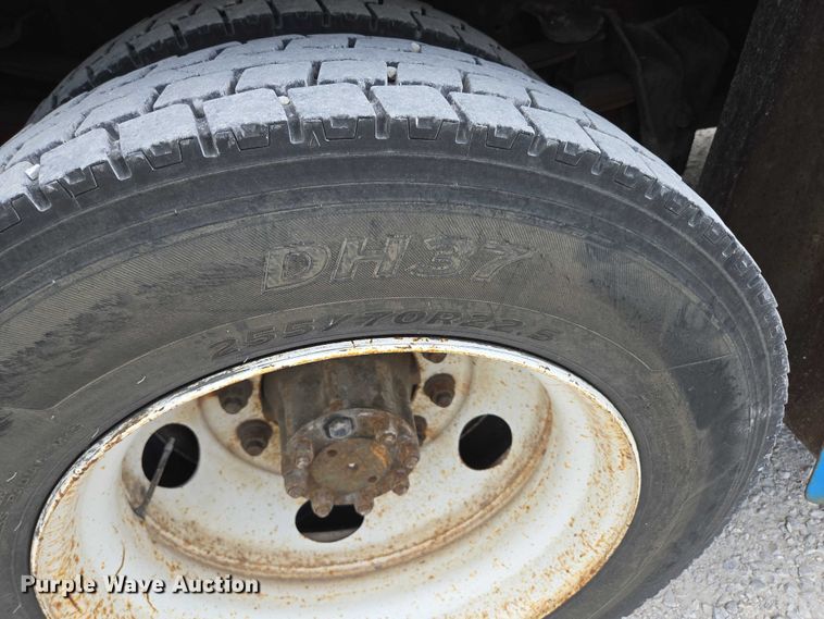 image for item ED2178 2000 International 4700 flatbed truck