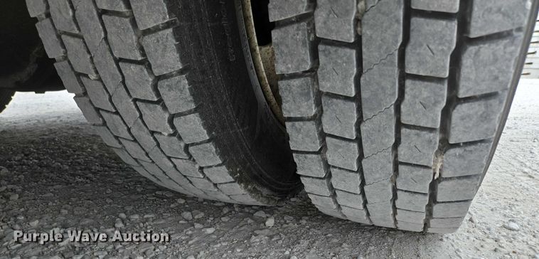 image for item ED2178 2000 International 4700 flatbed truck