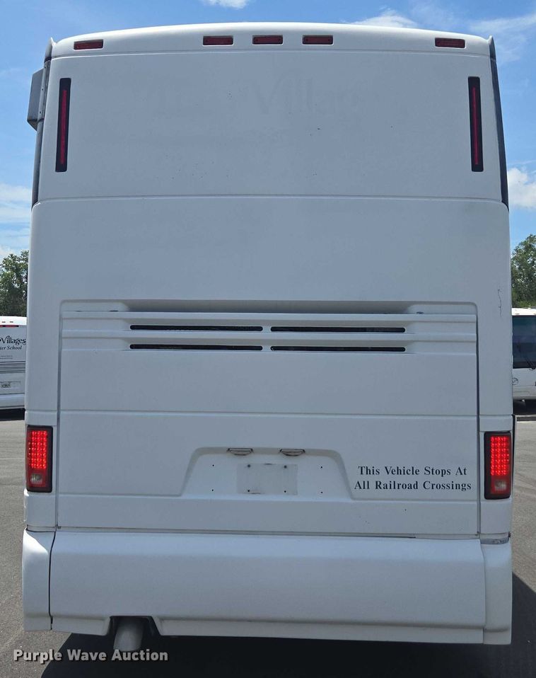 image for item DU7958 1999 Motor Coach Industries coach bus