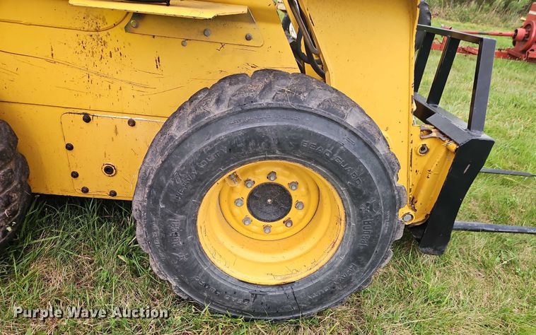 image for item EB8235 1999 John Deere 270 skid steer loader