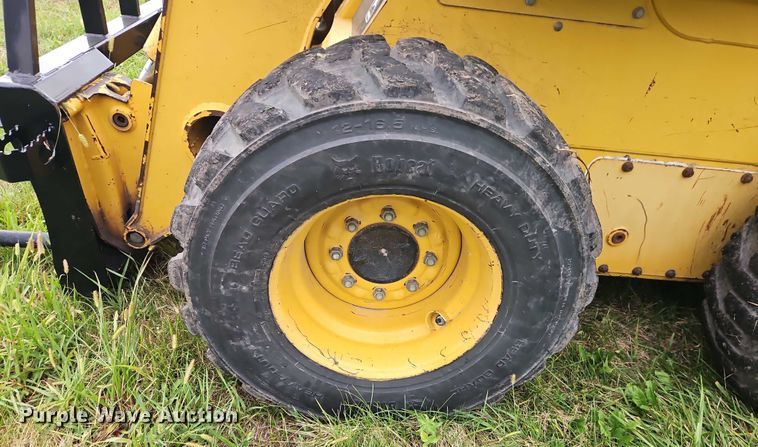 image for item EB8235 1999 John Deere 270 skid steer loader