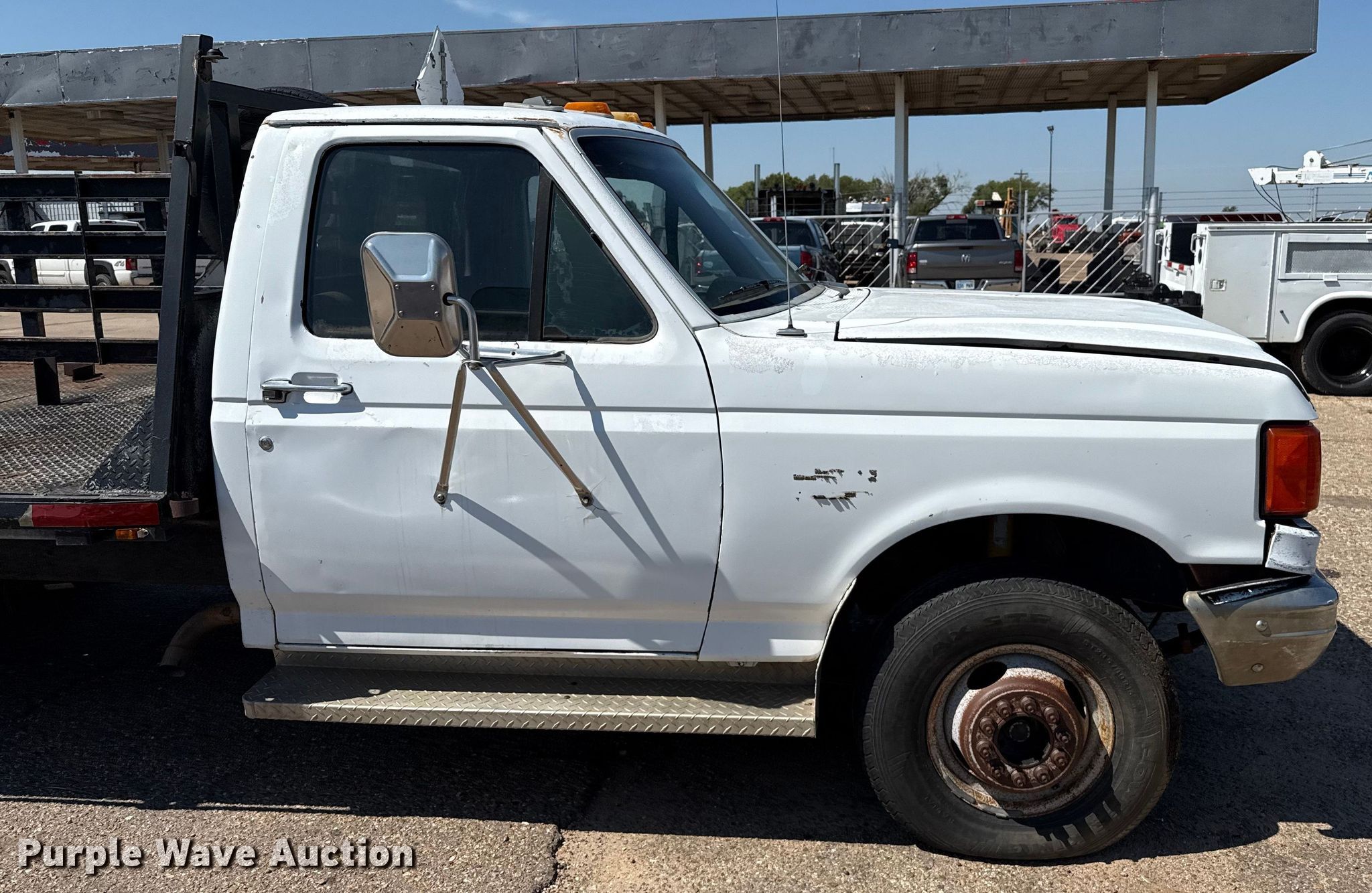 1990 Ford F350 flatbed pickup truck in Liberal, KS | Item DZ8880