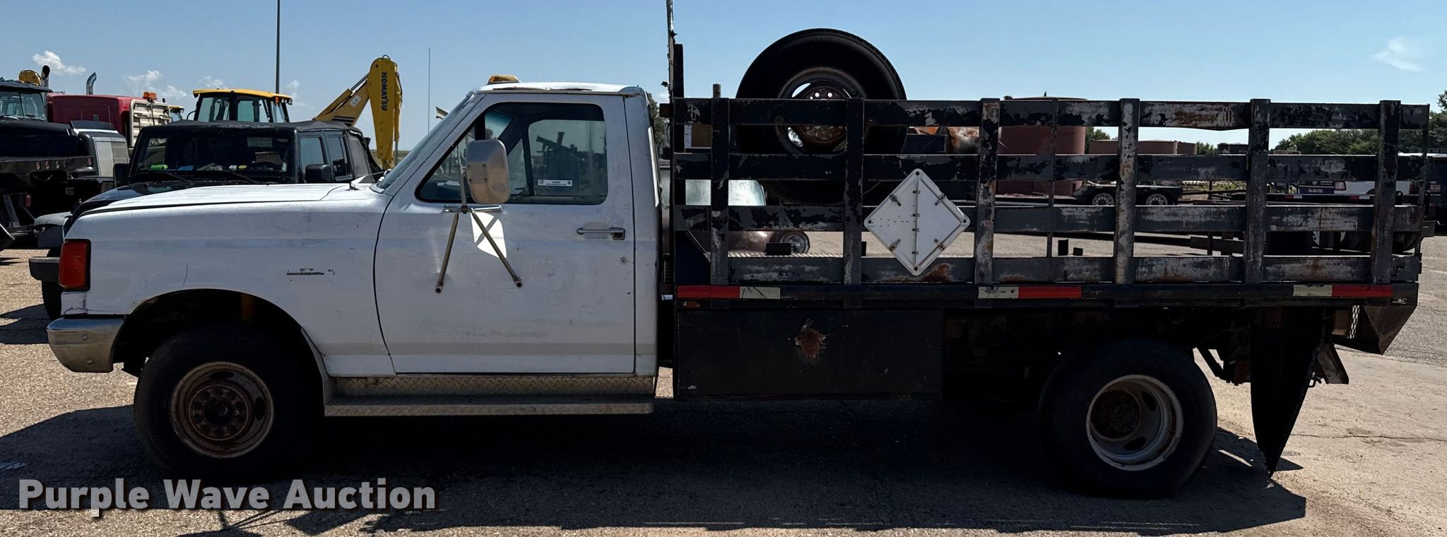 1990 Ford F350 flatbed pickup truck in Liberal, KS | Item DZ8880