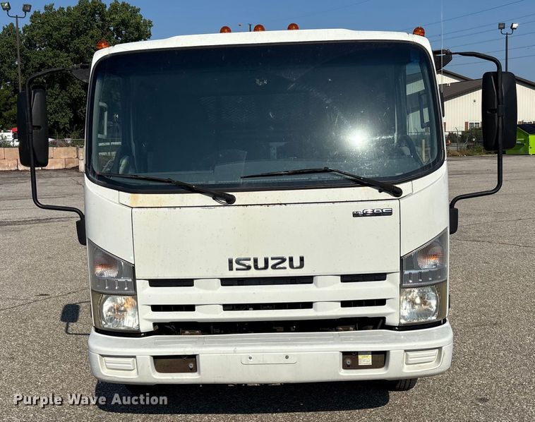 image for item DT3265 2012 Isuzu NPR crew cab flatbed truck