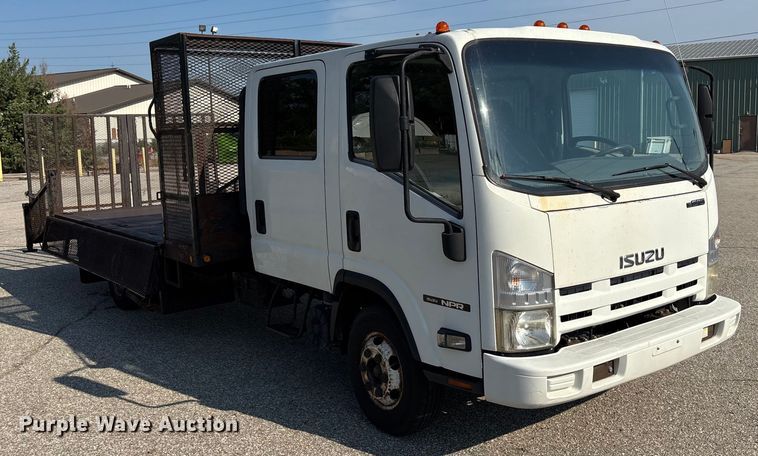 image for item DT3265 2012 Isuzu NPR crew cab flatbed truck