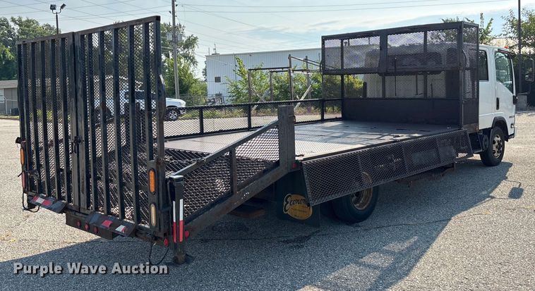 image for item DT3265 2012 Isuzu NPR crew cab flatbed truck