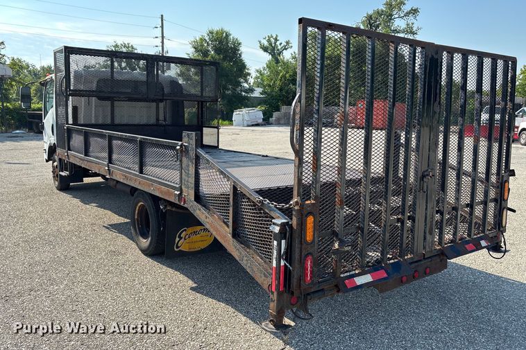 image for item DT3265 2012 Isuzu NPR crew cab flatbed truck