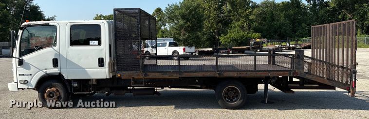 image for item DT3265 2012 Isuzu NPR crew cab flatbed truck