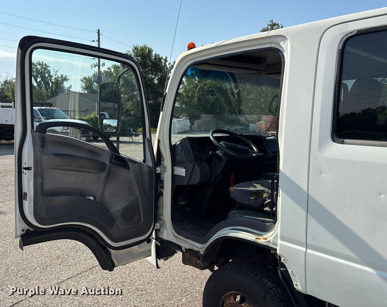 image for item DT3265 2012 Isuzu NPR crew cab flatbed truck