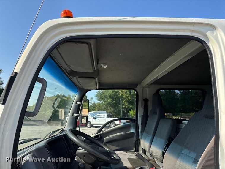 image for item DT3265 2012 Isuzu NPR crew cab flatbed truck