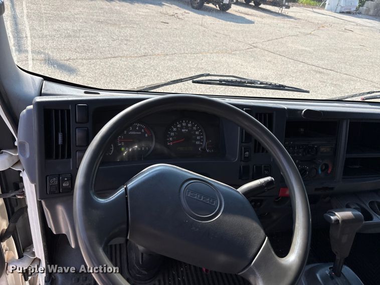 image for item DT3265 2012 Isuzu NPR crew cab flatbed truck