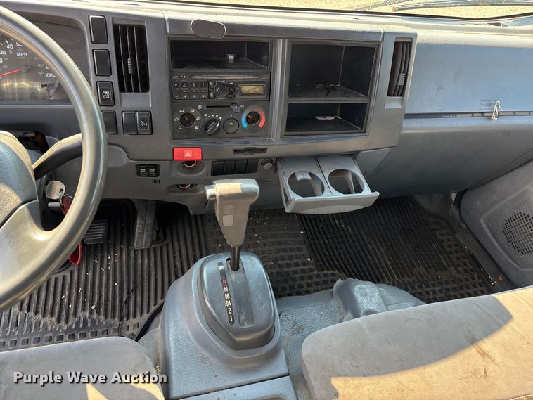 image for item DT3265 2012 Isuzu NPR crew cab flatbed truck