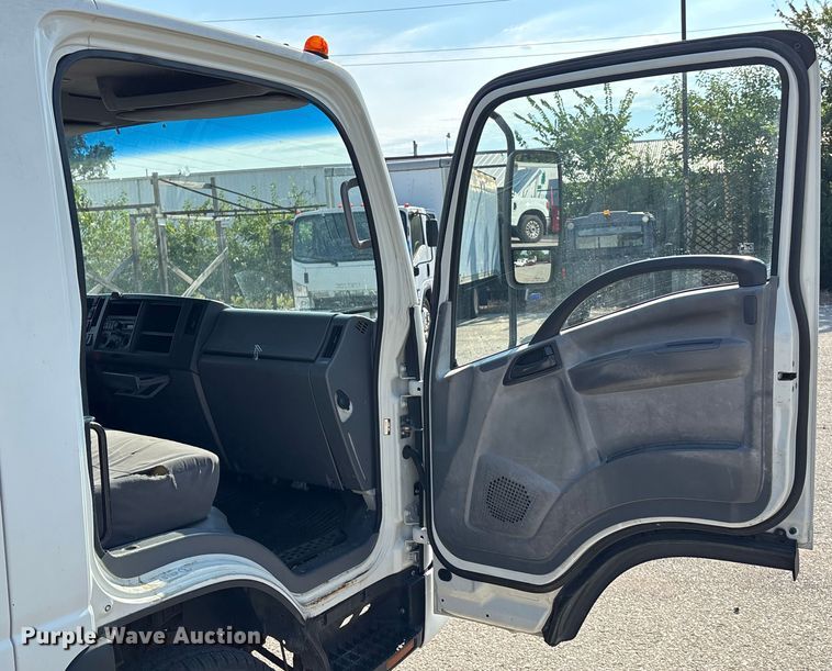 image for item DT3265 2012 Isuzu NPR crew cab flatbed truck