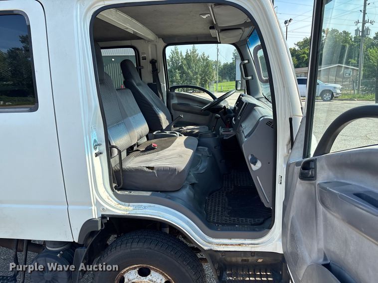 image for item DT3265 2012 Isuzu NPR crew cab flatbed truck