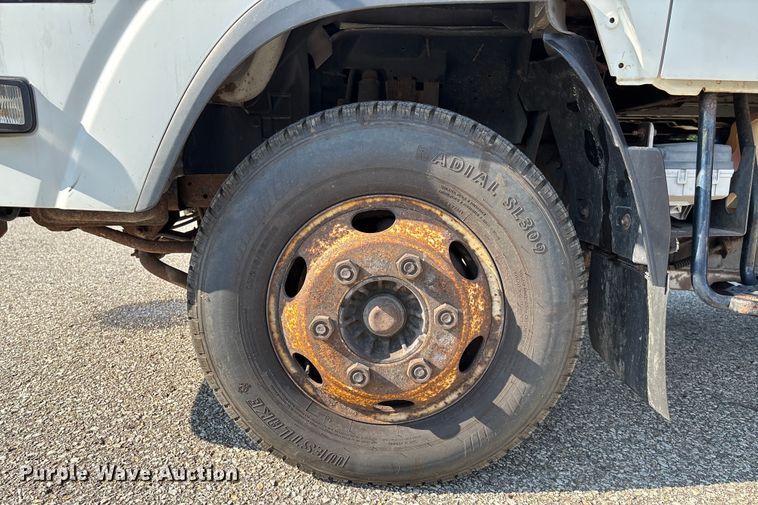 image for item DT3265 2012 Isuzu NPR crew cab flatbed truck