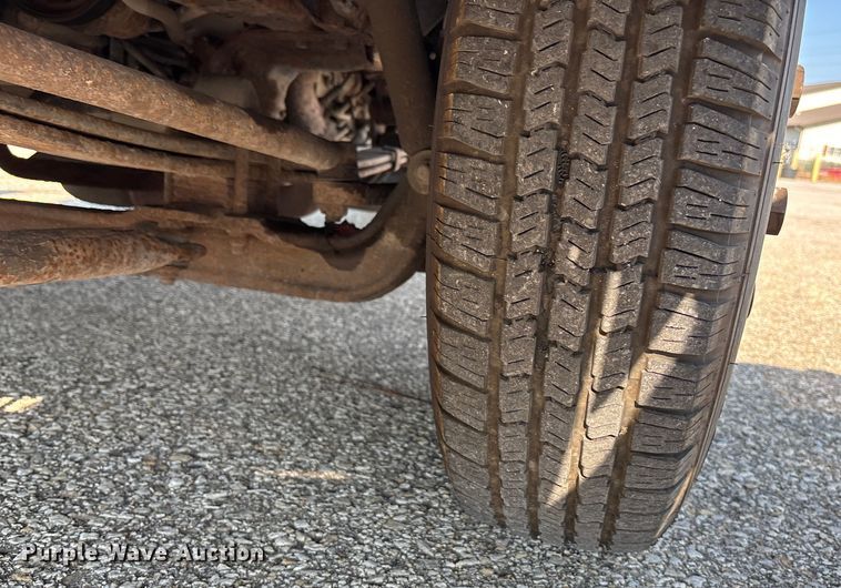 image for item DT3265 2012 Isuzu NPR crew cab flatbed truck