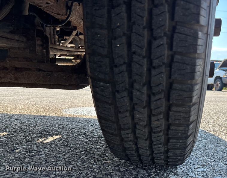 image for item DT3265 2012 Isuzu NPR crew cab flatbed truck