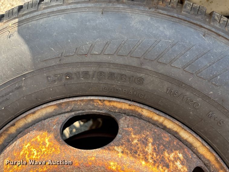 image for item DT3265 2012 Isuzu NPR crew cab flatbed truck