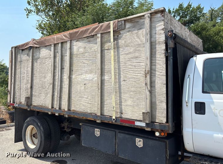 image for item DT3268 2013 Ford F750 Super Duty dump flatbed truck