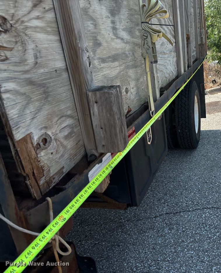 image for item DT3268 2013 Ford F750 Super Duty dump flatbed truck