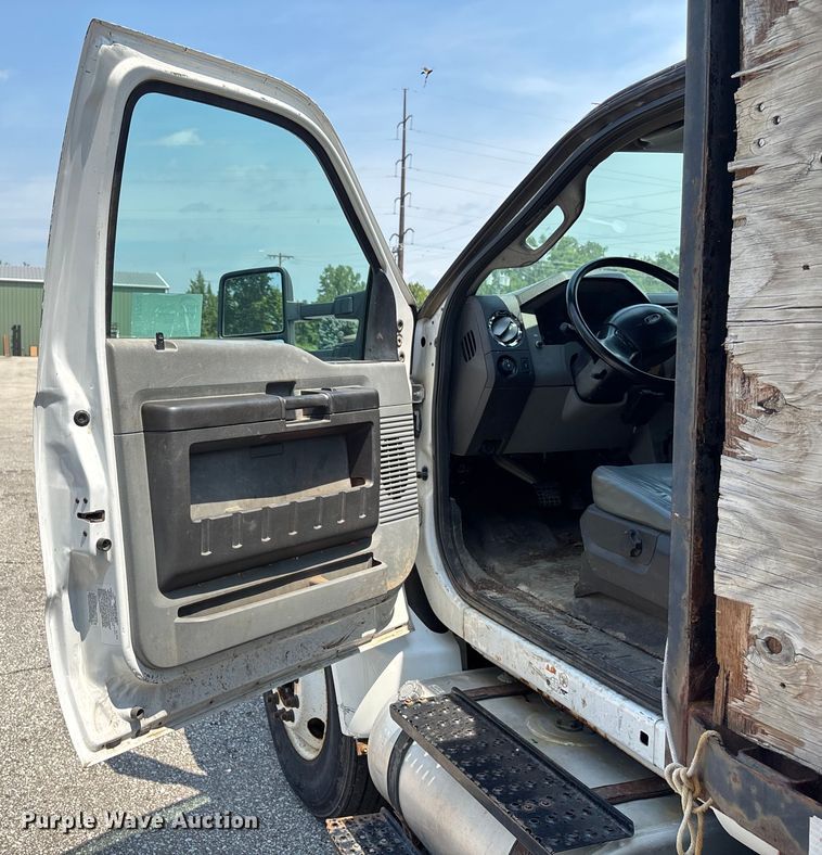 image for item DT3268 2013 Ford F750 Super Duty dump flatbed truck