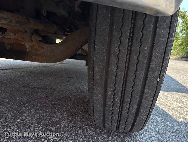 image for item DT3268 2013 Ford F750 Super Duty dump flatbed truck