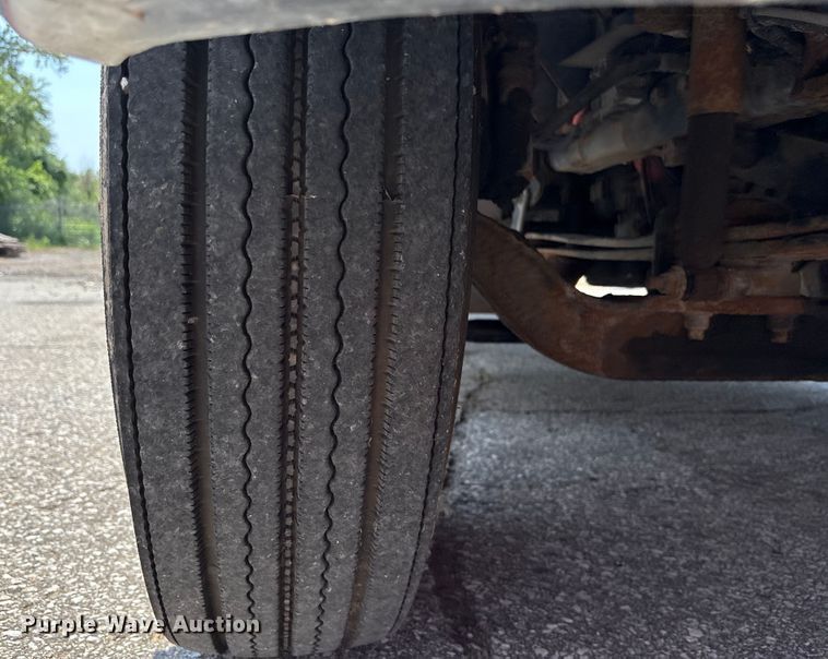 image for item DT3268 2013 Ford F750 Super Duty dump flatbed truck