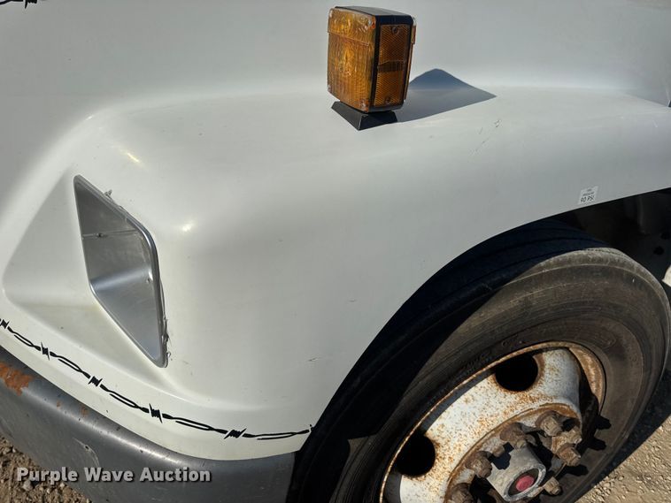 image for item DW3495 1999 Freightliner FL60 flatbed truck