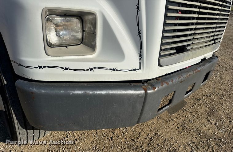 image for item DW3495 1999 Freightliner FL60 flatbed truck