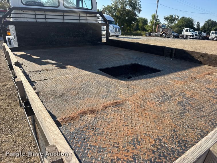 image for item DW3495 1999 Freightliner FL60 flatbed truck