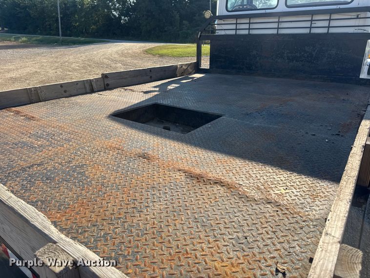 image for item DW3495 1999 Freightliner FL60 flatbed truck