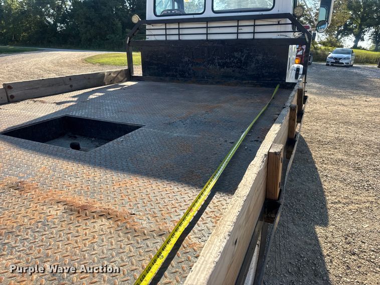 image for item DW3495 1999 Freightliner FL60 flatbed truck