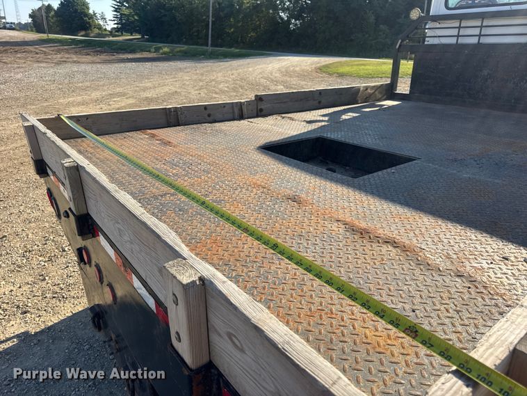 image for item DW3495 1999 Freightliner FL60 flatbed truck