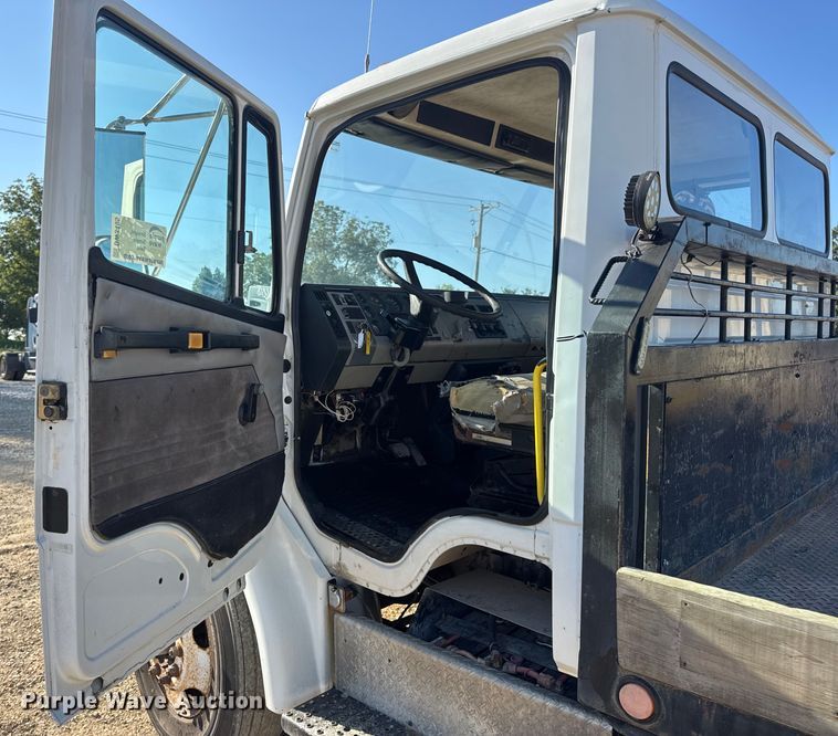 image for item DW3495 1999 Freightliner FL60 flatbed truck