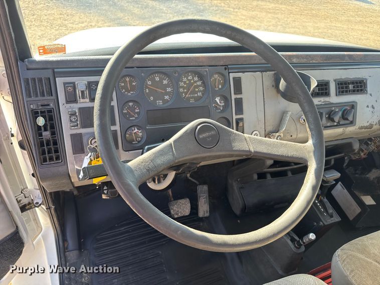 image for item DW3495 1999 Freightliner FL60 flatbed truck