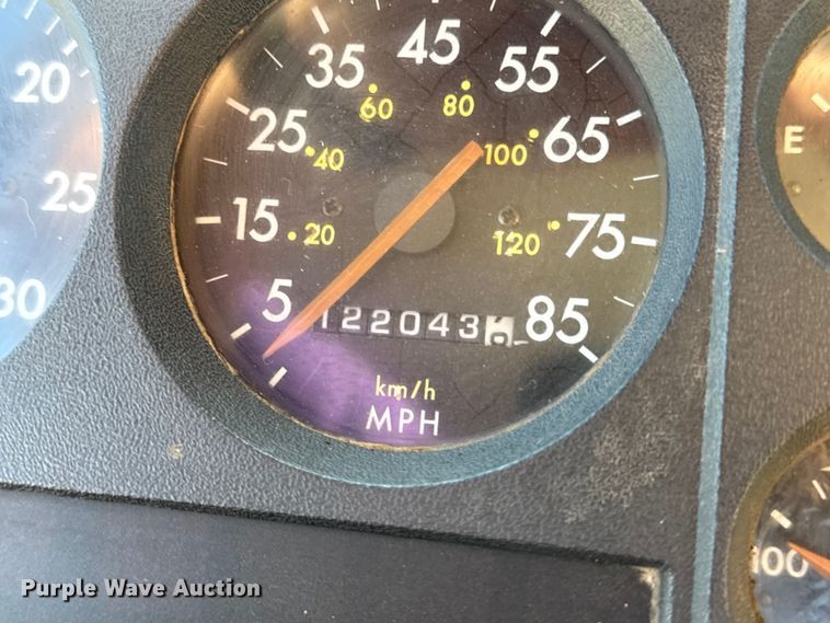 image for item DW3495 1999 Freightliner FL60 flatbed truck