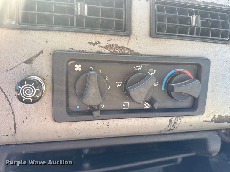 image for item DW3495 1999 Freightliner FL60 flatbed truck