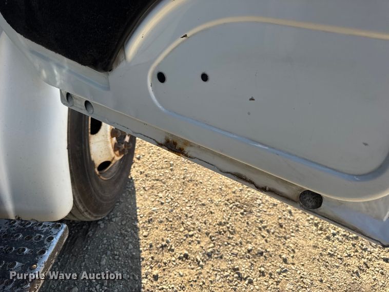 image for item DW3495 1999 Freightliner FL60 flatbed truck