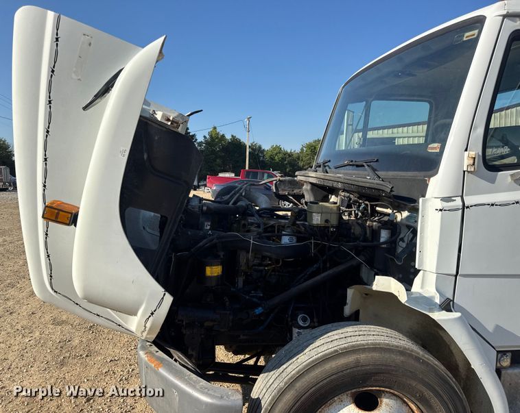 image for item DW3495 1999 Freightliner FL60 flatbed truck