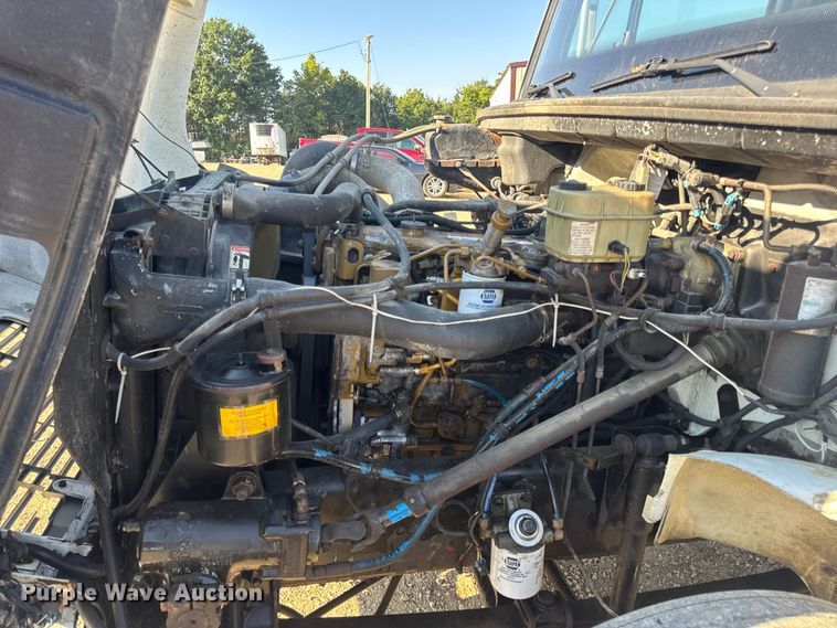 image for item DW3495 1999 Freightliner FL60 flatbed truck