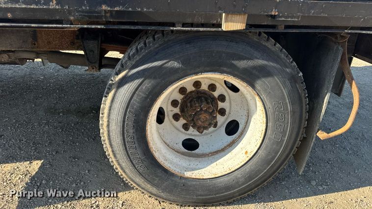 image for item DW3495 1999 Freightliner FL60 flatbed truck