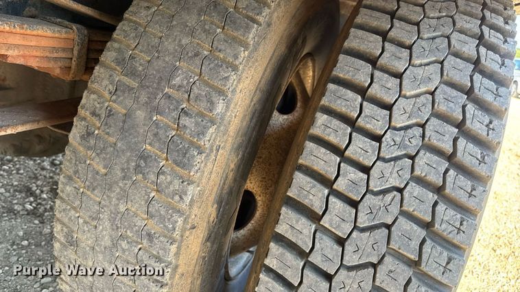 image for item DW3495 1999 Freightliner FL60 flatbed truck