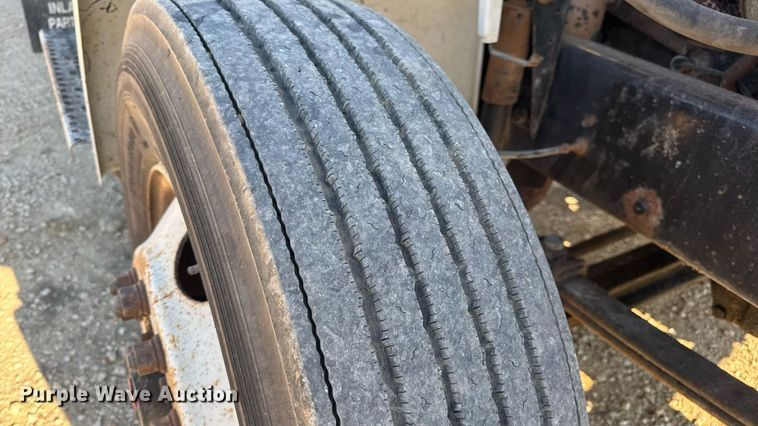 image for item DW3495 1999 Freightliner FL60 flatbed truck