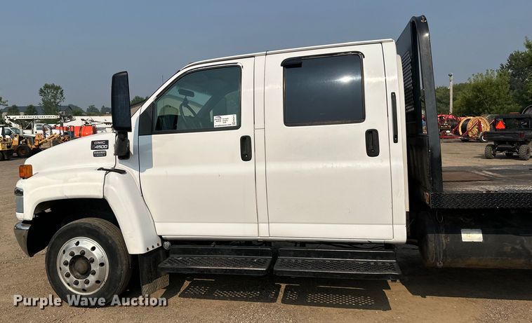 image for item EB2810 2004 GMC C4500 Crew Cab flatbed truck