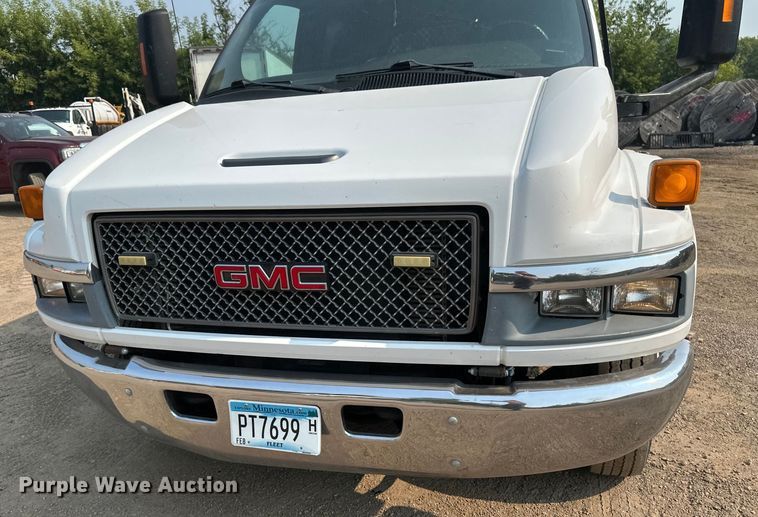 image for item EB2810 2004 GMC C4500 Crew Cab flatbed truck