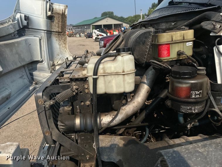 image for item EB2810 2004 GMC C4500 Crew Cab flatbed truck